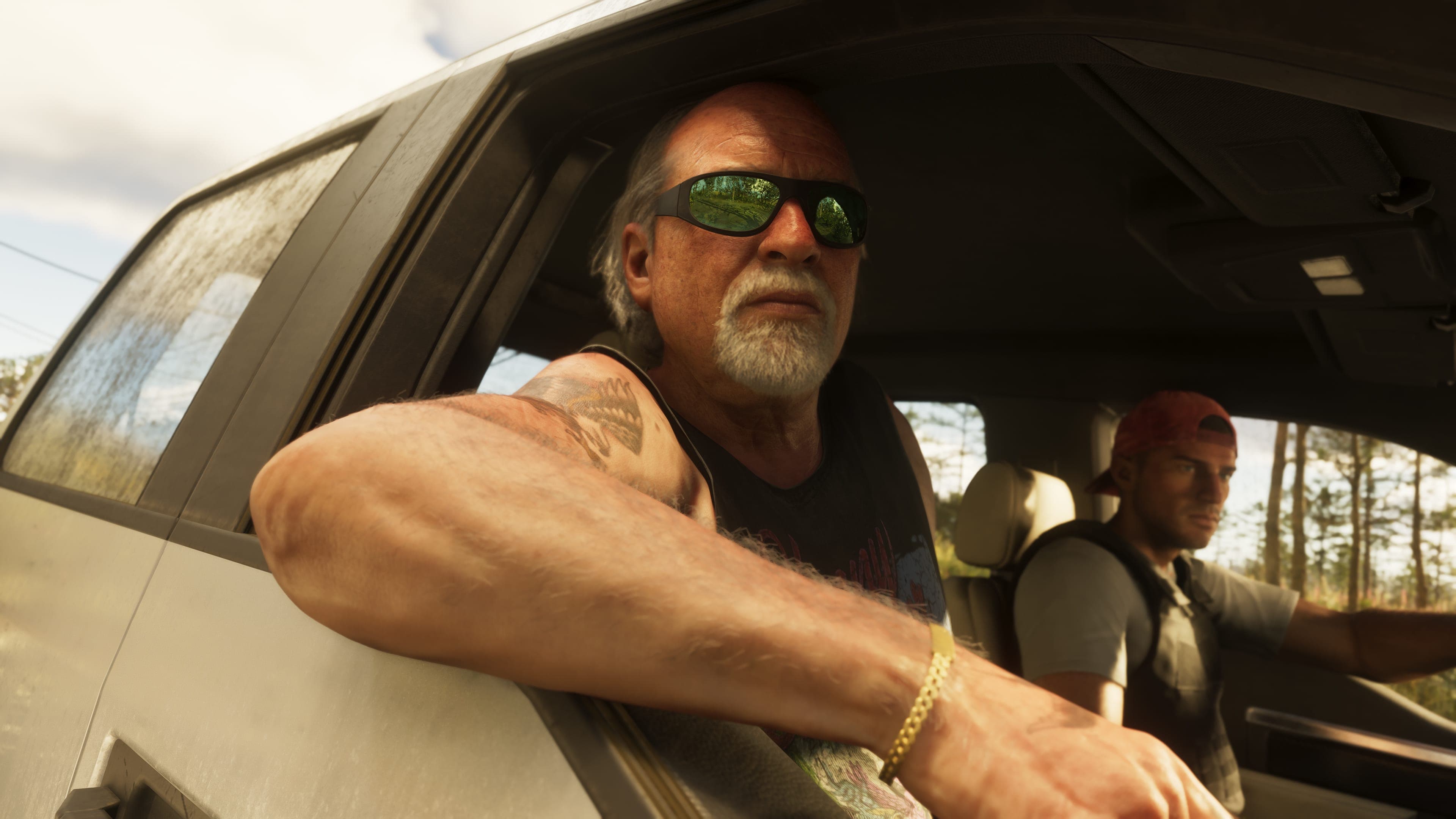 Official Rockstar Games render of Brian Heder — a Keys-based drug runner, depicted leaning out of a parked truck window in palm-tree surroundings, wearing mirrored sunglasses and a tank top. Jason Duval is visible in the passenger seat behind him.